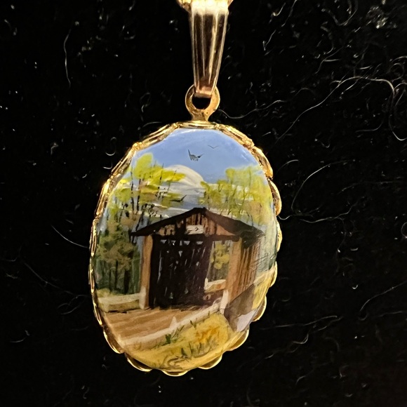 Vintage hand painted covered bridge pendant and chain. 18”chain and 1.5”
Pendant - Picture 1 of 6